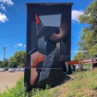 a large mural painted on a side of a building